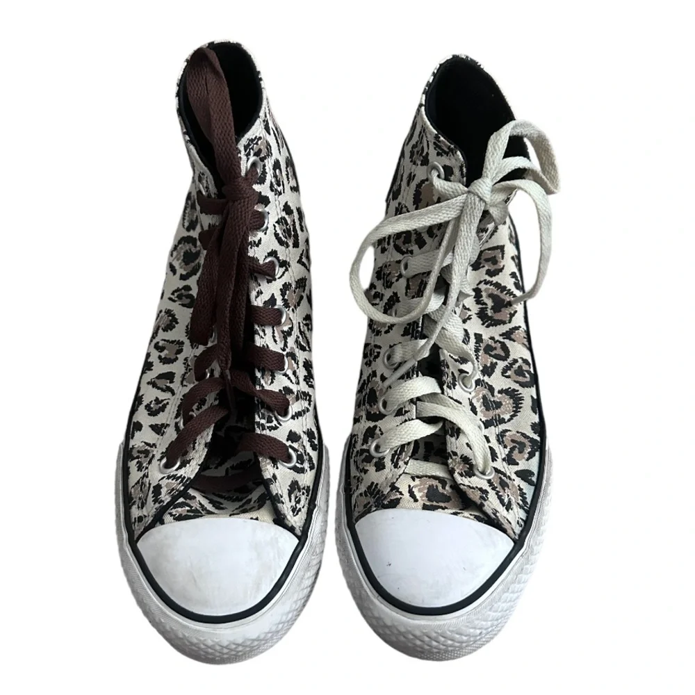 Converse animal print girls high top sneakers